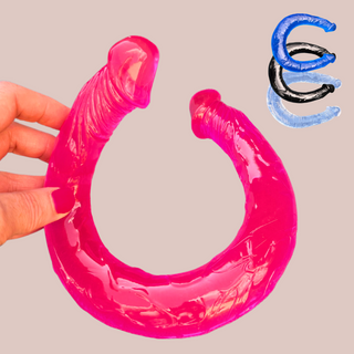 The 18 inch Double Ended Dildo shown in pink being held and in the top right are the three other colours available, blue, black and transparent.