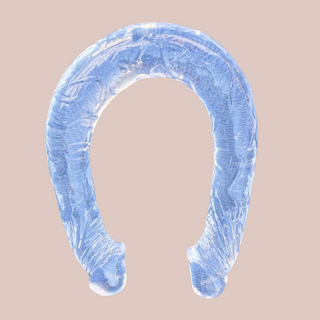 Image alt The transparent double ended dildo from House of Chastity, it is very bendable and has veins running through the full length.