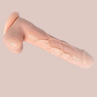 The Flesh Pink 7 Inch Dildo from House of Chastity, you can see the realistic head, veining and balls, as well as the sucker base.