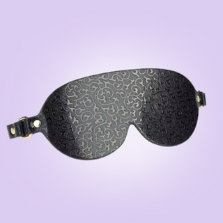 A close up of the eye mask, you can see the intricated pattern.