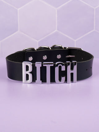 A picture of the Black Bitch collar showing spellout on the front.