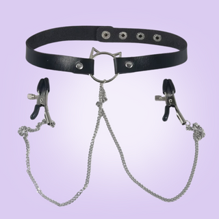 The cat ears collar and draped nipple chain with nipple clamps