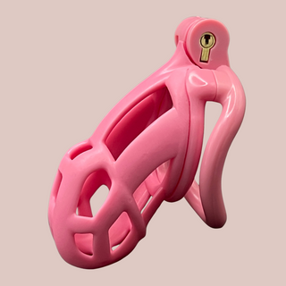 The pink Cobra Curved Cuff in size small, it is shown with its integral lock and curved base ring fitted.