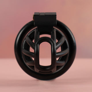 A front view of the black Cobra Nub Chastity Device, the base ring is fitted and you can see the airy design of the cage.