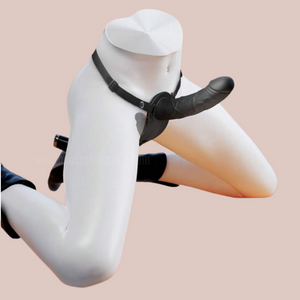 The vibrating Dildo is shown being modelled, the external dildo and waist strap can be seen