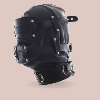 The Fetish Hood from House Of chastity in black shown from a side view. The hood is assembled, the eye mask and dildo gag are in place.