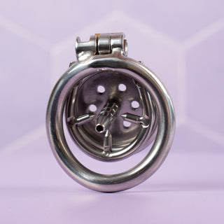 A rear view, from this angle you can see the spikes on the barbed ring and the urethral tube rising from the cage.