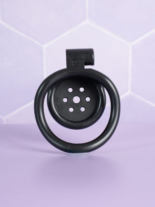 A back view of the flat gatling black chastity cage.