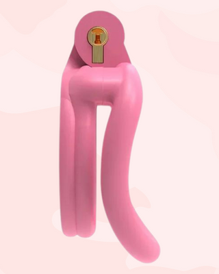 An alternate view of the Flat Gatling Pink with curved base rings, it shows just how flat the chastity cage is when fixed to its base ring.