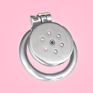 The Flat Gatling chastity device with urethral tube from House Of Chastity, it is shown here with the urethral tube fitted, it is a removable tube.