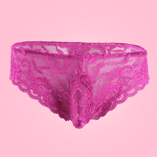 Floral lace panties from House Of Chastity. The knickers are bright pink, and are in a bikini style with penis pouch.
