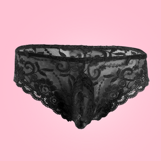 Floral lace panties from House Of Chastity. The knickers are black, and are in a bikini style with penis pouch.