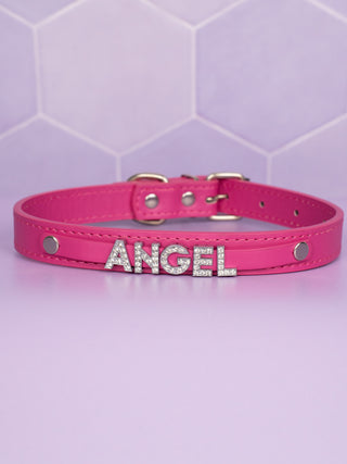The hot pink collar with Angel in rhinestone lettering.