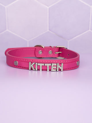 The Hot Pink Glimmer Kitten Collar shown fully assembled, the KITTEN lettering can be clearly seen.