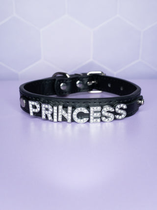 The rhinestone Princess lettering on the black collar