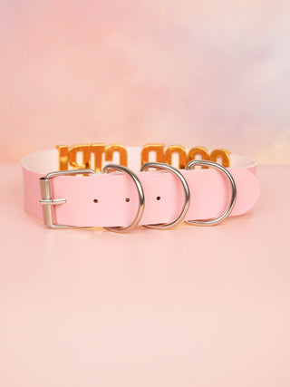 The Good Girl Collar in pale pink is shown from the rear, the silver buckle fixing and adjustable length can be seen clearly.
