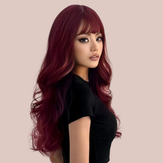 The long length dark red wig makes an impact, you can see how the straight fringe frames the face and the long locks can be styled or left to fall straight.