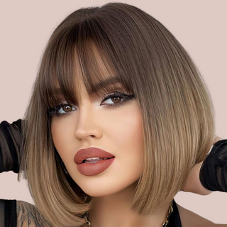 A cute chin length bob in a soft brown falling to blond. The straight lines make this style very fashionable.