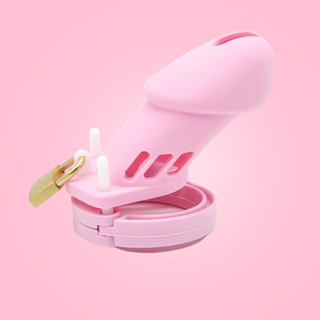 The HOC600 Silicone Standard chastity cage is shown here in pink fully assembled with the padlock in place