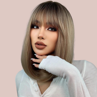 The dark blonde bob wig from House Of Chastity, you can see how the wig can be worn daily, it can be dressed up or down.