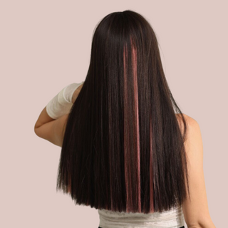 The back view shows how thick the dark haired wig is and how the pink highlights show through