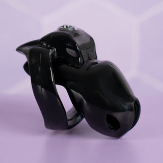 The HT V5 Nano Chastity cage shown here in black, fully assembled and with the push button lock in place.