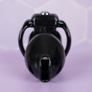 A front on view of the HT V5 chastity cage in black, you can see the air and urination holes built into the cage.