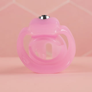 A rear view of the HT V5 Chastity Cage in pink.