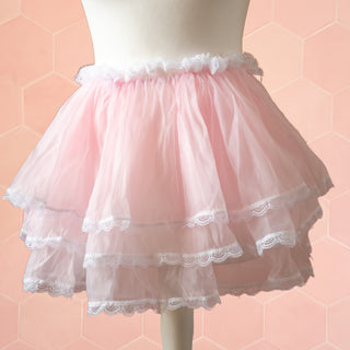 The skirt has a pretty three layered see through design