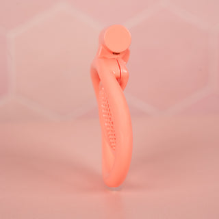 A side view of the inverted chastity cage, you can just see the concave cage.