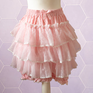 The Kawaii Cake Skirt in pink with cream lace edging.