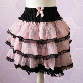 The Kawaii Cake Skirt in pink and black.