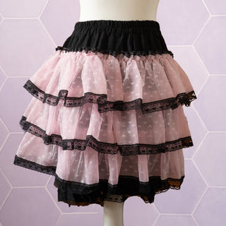 The rear view of the pink and black Kawaii Cake Skirt