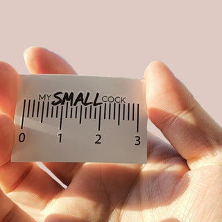 A close up image of the My Small Cock temporary tattoo, you can see that it shows a small 3 cm ruler with My Small Cock along the top.