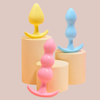 The pastel triple butt plug set from House Of Chastity, the set comes with 3 individual butt plugs in a gorgeous yellow, blue and pink. The 3 different shapes allows for long-term fun.