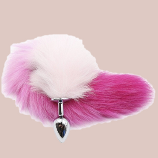 An alternate view of the pink and white fox tail and butt plug.