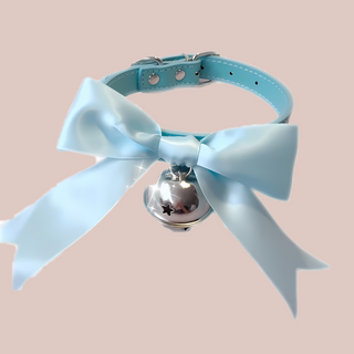 The blue soft ribbon collar bow from House Of Chastity, shown is the blue collar, matching soft satin ribbon and silver bell perfect attire for any sissy.