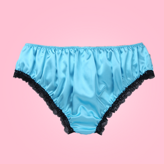 Back view, Adult knickers for men, sissy, lgbt, unisex. Made in blue satin with black lace detailing to the legs and panels on each side. There are also matching blue satin bows prettily applied.