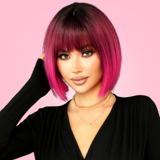 A front view of the vibrant pink bob wig, you can see the darker crown flowing down to the brighter pink ends of the hair.