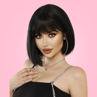 The black version of the sharp bob, you can see that it can be dressed up or down and how the fringe creates a soft fashionable look.