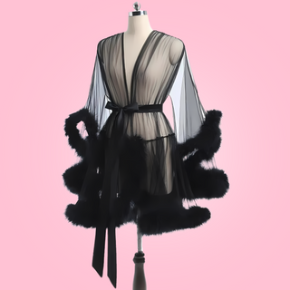 The black robe drapes over the body in a stylish way.