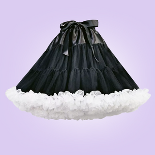 The black swing style petticoat, you can see the soft black petticoat with white edging, and the satin bow.