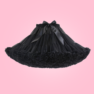 The black swing style petticoat, you can see the soft layers and matching satin bow.