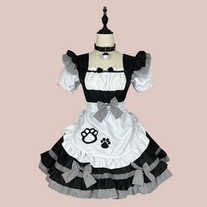 The Bella Black, White & Gingham maids dress, ithe full set of dress, apron, detachable bow and collar are all shown in the image.