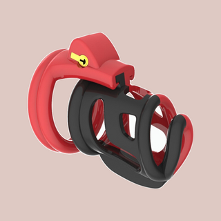 Showing how the plastic cock cage is half red and half black, this is then locked into place by the red base ring and then the integral lock can be fixed into place.