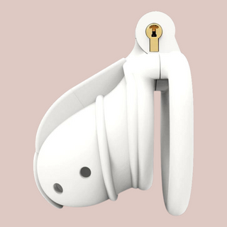 The white Wasp chastity cage from House Of Chastity, from the side profile it is shown with a flat ring and the integral lock in place.