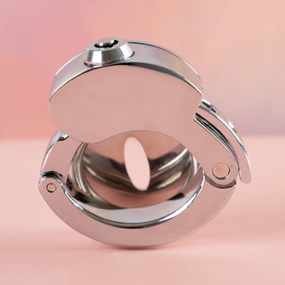 A view of the back of the chasttiy cage kit to show how it would fit.