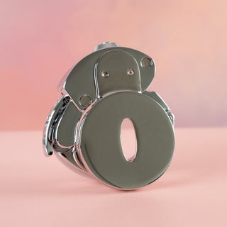 an angled view of The Bridewell Adjustable Base Ring Chastity Cage, the base ring is locked in place.