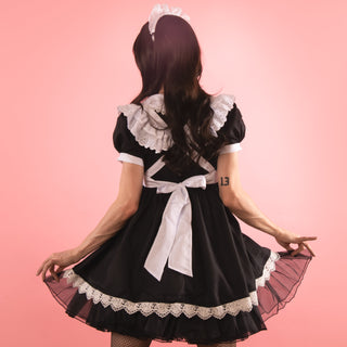 The rear view of the dress and apron.