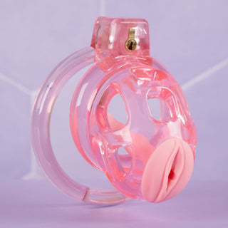 An angled view of the pink Custodian with the labia style urethral tube fitted.